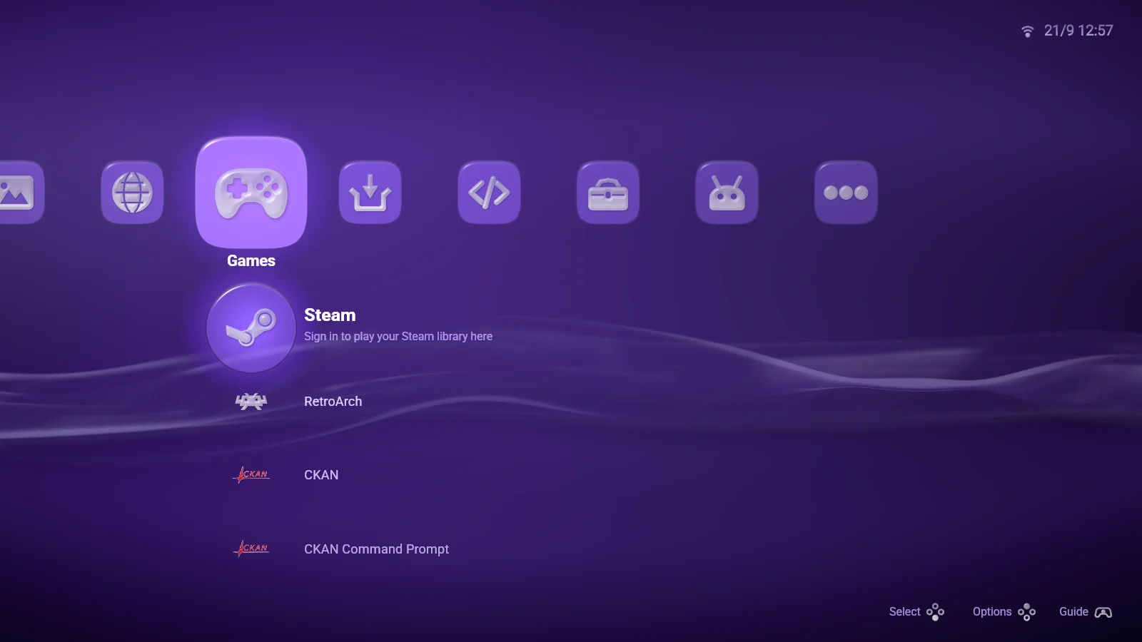 The Games column with the Steam row lit, RetroArch below it, on the purple wallpaper